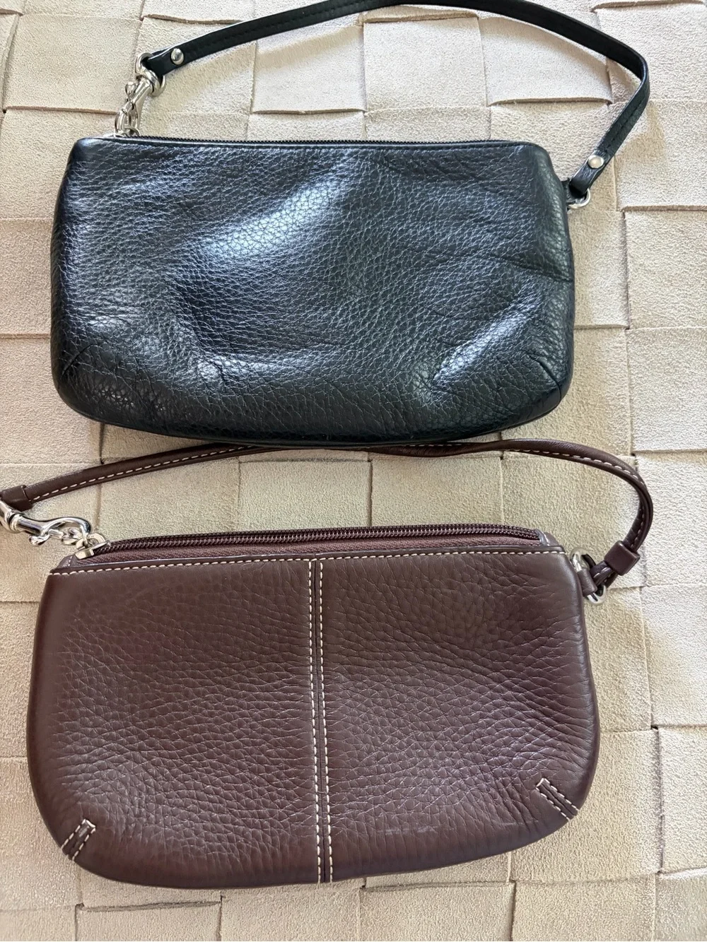 Two Leather Cluthes (Brown is Coach)